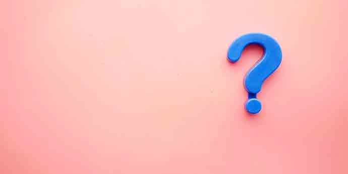 Blue question mark on a pink background image